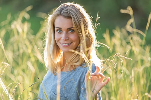 Woman Smiling Davoody & Hablinski Orthodontics in Houston, TX